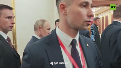 Его встретили дети с букетами, затем — серия важных встреч и международный форум